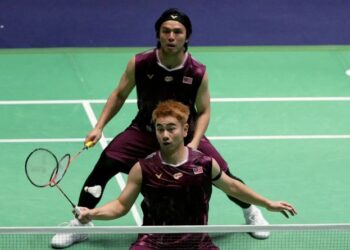 Goh Sze Fei-Nur Izzuddin Rumsani  berjaya melunaskan dendam terhadap gandingan Taiwan, Lee Jhe Huei-Yang Po Hsuan apabila mara ke suku akhir China Masters di Shenzen, semalam. - AFP