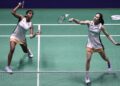 Pearly Tan-M. Thinaah menewaskan gandingan Indonesia, Febriana Dwipuji Kusuma-Meilysa Trias Puspitasari 21-18, 21-17 pada aksi pusingan kedua Terbuka Hong Kong, hari ini. - AFP