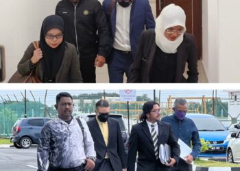 TERTUDUH (berpelitup muka) berjalan masuk ke pekarangan Kompleks Mahkamah Kangar, Perlis, bagi menghadapi pertuduhan mengemukakan butir matan palsu berjumlah RM490,000 lima tahun lalu.-UTUSAN