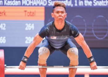 Muhamad Aniq Kasdan cedera ketika menyertai Kejohanan Asia di China. - AFP