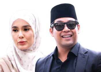KAMAL Adli dan Uqasha ketika hadir pada prosiding perceraian melibatkan mereka di Mahkamah Syariah Wilayah Persekutuan di Kuala Lumpur, semalam.