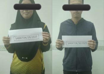 DUA suspek yang ditangkap kerana disyaki menjadi keldai akaun.