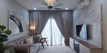 ruang tamu dilatari dengan rona kelabu lembut membangkitkan suasana moden minimalis.