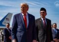 ANWAR Ibrahim semasa menyambut ketibaan Presiden Amerika Syarikat, Donald Trump. - PEJABAT PERDANA MENTERI
