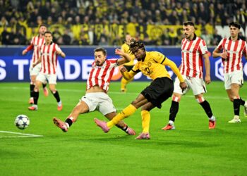 PEMAIN tengah Borussia Dortmund, Carney Chukwuemeka menjaringkan gol kedua pasukannya ketika menewaskan Athletic Bilbao 4-1 dalam aksi kedua Liga Juara-Juara di Stadium Signal Iduna, semalam. - AFP