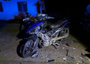 KEADAAN motosikal mangsa kemalangan maut meragut satu nyawa di Kilometer 17 Jalan Gua Musang-Lojing dekat Kampung Star Baru, Gua Musang, Kelantan. -  IHSAN POLIS