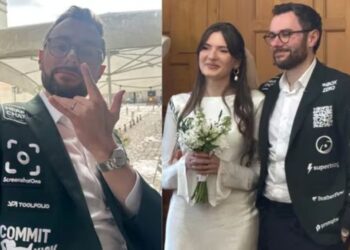 DAGOBERT Renouf  memakai jaket dipenuhi logo syarikat pemula ketika majlis perkahwinannya di Perancis.-AGENSI