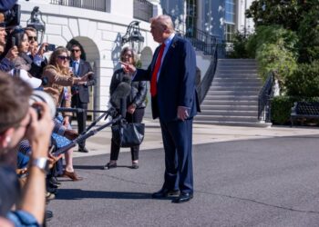 PRESIDEN AS, Donald Trump berucap kepada media di halaman selatan Rumah Putih di Washington, DC, pada 5 Oktober lalu.- AFP