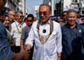 ANWAR Ibrahim ketika hadir pada Program Rancakkan Madani Sabah di Pusat Konvensyen Antarabangsa Sabah (SICC), semalam. - PEJABAT PERDANA MENTERI
