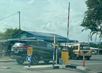PELAKSANAAN parkir pintar di Perlis ditangguhkan selama enam bulan sejak Julai lalu bagi memberi ruang penambahbaikan oleh syarikat pengendali di Kangar, Perlis semalam.-UTUSAN/ASYRAF MUHAMMAD