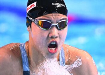 Yu Zidi mencipta sejarah memecahkan rekod Asia dalam acara 200 meter rampaian individu pada kejohanan kebangsaan negaranya. - AFP