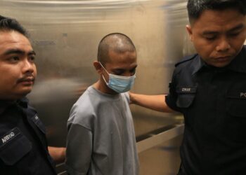 ABDUL Rahman Mohamad Hussain atau dikenali ‘Man Hidung’ ketika di Mahkamah Majistret Kuala Terengganu. - UTUSAN/PUQTRA HAIRRY