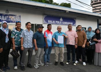 SHAMSUL Iskandar Mohd. Akin membuat laporan polis di Balai Polis Sandakan, Sabah petang tadi.