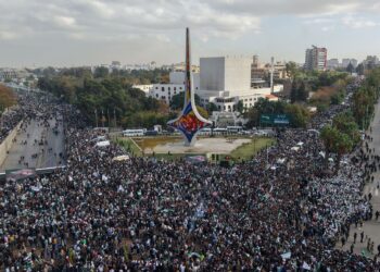 RAKYAT Syria meraikan genap setahun kejatuhan rejin Bashar al-Assad di Damsyik. – AFP