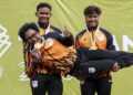1) (DARI kiri) atlet berbasikal trek, Muhammad Ridwan Sahrom, Muhammad Fadhil Mohd Zonis dan Mohd Akmal Nazimi Jusena meraikan kejayaan memenangi pingat emas dalam acara pecut berpasukan lelaki Sukan SEA Thailand. - UTUSAN/FARIZ RUSADIO