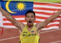 Andre Anura Anuar meraih pingat emas dalam acara lompat jauh dengan catatan 7.71 meter di Sukan SEA 2025, kelmarin. -UTUSAN/FARIZ RUSADIO