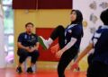 Azeira Lusian bermain dalam posisi apit iri dalam skuad sepak takraw wanita kebangsaan.