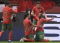 Penyerang Maghribi, Ayoub El Kaabi meraikan jaringan gol dilakukannya dengan rakan sepasukan dalam aksi sulung Piala Negara-Negara Afrika menentang Comoros di Stadium Putera Moulay Abdellah, Rabat, kelamrin. - AFP