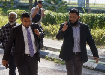 PAPAGOMO didakwa di Mahkamah Sesyen Sepang atas pertuduhan membuat dan memulakan hantaran komunikasi palsu pada Mei lalu. - UTUSAN/FAISOL MUSTAFA