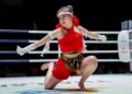 ATLET muay Thai negara, Yan Jia Chi beraksi dalam acara Wai Kru individu wanita akhir pada Sukan SEA Thailand 2025 di Stadium Boxing Lumpinee di sini hari ini. GAMBAR: FARIZ RUSADIO