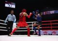 ATLET muay Thai negara, Muhammad Mikail Ghazali Zulfikar beraksi menentang atlet Thailand, Suphakon Sirilun dalam acara 57kg lelaki pada Sukan SEA Thailand 2025 di Stadium Boxing Lumpinee di sini hari ini. GAMBAR: FARIZ RUSADIO