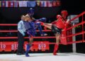 ATLET muay Thai negara, Wassof Rumijam beraksi menentang atlet Thailand, Thongchai Huanak dalam acara 54kg lelaki pada Sukan SEA Thailand 2025 di Stadium Boxing Lumpinee di sini hari ini. GAMBAR: FARIZ RUSADIO