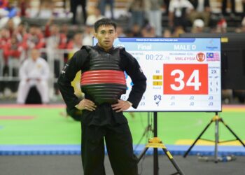 PESILAT negara, Muhammad Izzul Irfan Marzuki meraih emas seleps kem Malaysia melakukan bantahan.