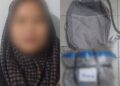 WANITA yang ditahan kerana memiliki bunga ganja bernilai RM33,000 ketika menunggang motosikal di Jalan Kuala Kedah, Alor Setar.