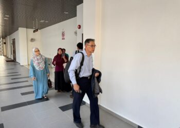 WAN Mohd. Zamri Wan Ismail semasa menghadiri prosiding perbicaraan di Mahkamah Sesyen, Kota Bharu, Kelantan.