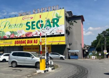 KERAJAAN negeri sedang meneliti penambahbaikan terhadap pelaksanaan sistem parkir berpalang di sekitar Perlis yang ditangguhkan sejak awal Julai lalu di Kangar, Perlis hari ini. -UTUSAN/ASYRAF MUHAMMAD