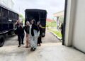 SEBAHAGIAN tertuduh diiringi polis semasa menghadiri prosiding perbicaraan di Mahkamah Kota Bharu, Kelantan hari ini.