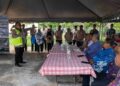 AHMAD Zahid Hamidi (kanan) mendengar taklimat mengenai Projek Rancangan Tebatan Banjir (RTB) Bagan Datuk ketika lawatan ke Kampung Sungai Balai Baroh di Bagan Datuk hari ini.