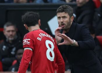 Michael Carrick disenangi pemain Manchester United sehinggakan mereka menuruti segala perancangan yang diarahkan jurulatih sementara itu. - AFP