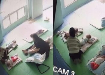 Tangkap layar video tular memaparkan pengasuh yang melakukan kekasaran terhadap bayi di sebuah pusat asuhan kanak-kanak di Cheras.