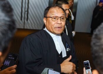 PEGUAM Negara, Tan Sri Mohd. Dusuki Mokhtar ditemui media selepas Majlis Pembukaan Tahun Perundangan 2026 di Pusat Pameran dan Perdagangan Antarabangsa Malaysia (MITEC), di sini hari ini. -UTUSAN/Saddam Yusoff