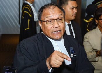 PEGUAM Negara, Tan Sri Mohd. Dusuki Mokhtar ditemui media selepas Majlis Pembukaan Tahun Perundangan 2026 di Pusat Pameran dan Perdagangan Antarabangsa Malaysia (MITEC), di sini hari ini. -UTUSAN/Saddam Yusoff