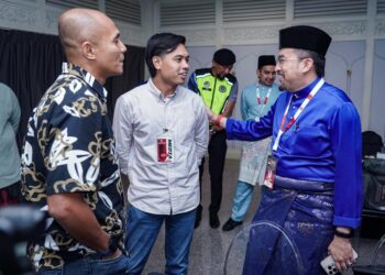 ASYRAF Wajdi Dusuki meninjau Laman Media Perhimpunan Agung UMNO 2025.