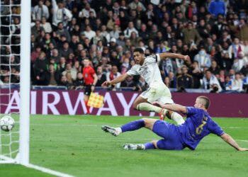 PEMAIN Real Madrid, Jude Bellingham menjaringkan gol keenam untuk pasukannya ketika membelasah Monaco 6-1 dalam aksi Liga Juara-Juara di laman sendiri semalam. - AFP