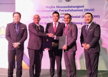 H'NG Mooi Lye (tengah) ketika hadir pada majlis pemeteraian MoU antara Perkeso dan MBPP di George Town, Pulau Pinang hari ini.-UTUSAN/SAFINA RAMLI