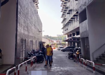 MAYAT remaja perempuan berusia 13 tahun yang dipercayai terjatuh dari sebuah pangsapuri di Gelugor, Pulau Pinang dijumpai oleh orang ramai di laluan bawah pangsapuri tersebut, hari ini.-GAMBAR/MEDIA SOSIAL