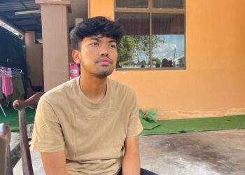 MUHAMMAD Khairul Hakimi Shamsul Zahari kelihatan sugul ketika ditemui di Taman Sultan Abdul Halim, Tanjung Bendahara di Alor Setar, hari ini.