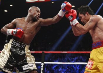 Pertarungan Floyd Mayweather Jr. dan Manny Pacquiao di Las Vegas, Nevada pada 2015. - AFP