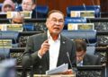 ANWAR Ibrahim ketika sesi Waktu Pertanyaan-Pertanyaan Perdana Menteri di Dewan Rakyat, Kuala Lumpur, semalam. - GAMBAR/JABATAN PENERANGAN