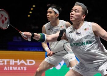 Aaron Chia-Soh Wooi Yik gagal membawa pulang gelaran All England selepas tewas kepada pasangan Korea Selatan, Kim Won-ho-Seo Seung-jae dalam perlawanan akhir di Birmingham, kelmarin. - AFP
