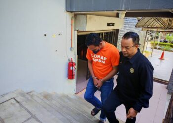 SURUHANJAYA Pencegahan Rasuah Malaysia (SPRM) Pahang menahan reman seorang anggota penguat kuasa trafik negeri ini kerana disyaki meminta dan menerima rasuah RM30,000.