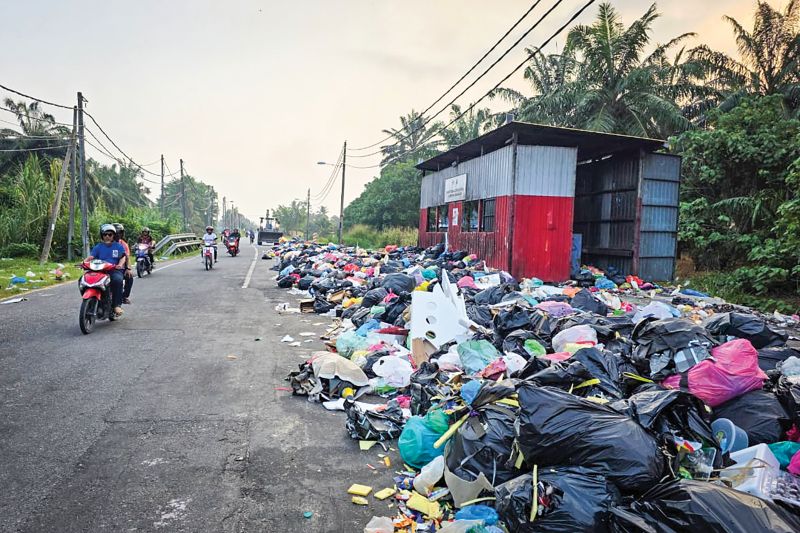 Sampah cemar imej Kampung Angkat Madani