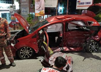 KEADAAN lokasi kemalangan di Jalan Machang-Tanah Merah dekat Bandar Baru Tanah Merah, Kelantan.