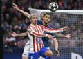 Penyerang Atletico Madrid, Antoine Griezmann (kiri) diasak pemain pertahanan Arsenal, William Saliba dalam aksi separuh akhir pertama Liga Juara-Juara di Stadium Metropolitano, Madrid, semalam. - AFP