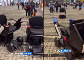 DUA buah kerusi roda salaing menghalang laluan antara satu sama lain. - Instagram/Rishi Budhran