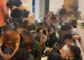 SEBAHAGIAN warga asing yang ditahan dalam serbuan berasingan di Bandar Baru Segari, Manjung semalam.
